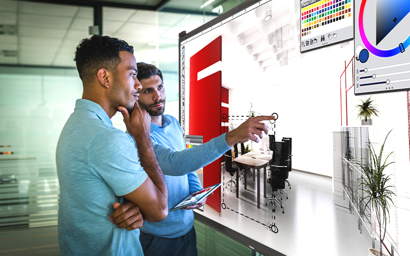 Collaboration at your fingertips. Male employee using touchscreen.
