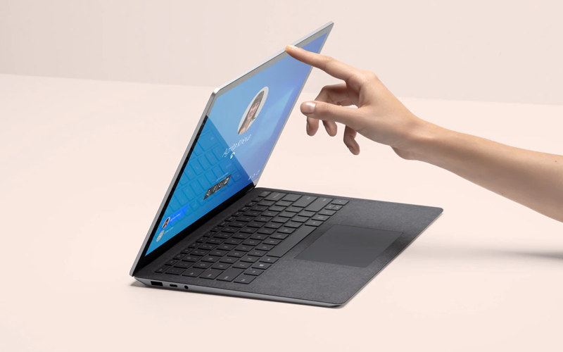 Surface Laptop on table half open