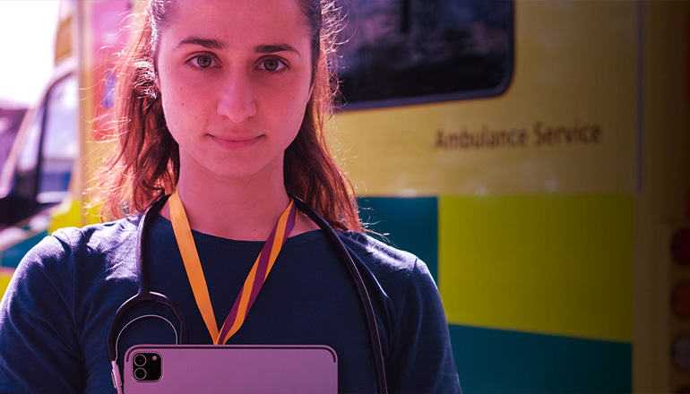 paramedic holding a tablet