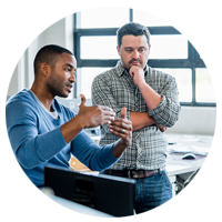 Co-workers discussing application development