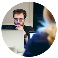 Man working in security on laptop image