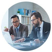 Two dedicated software experts using computer