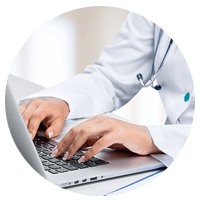 Doctor typing on laptop