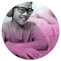 Grade school child on Chromebook computer at home