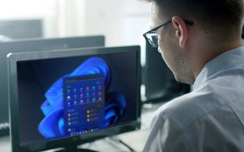 Enhanced performance Man using his computer for work