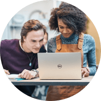 Two person working in store using a dell laptop