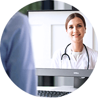 Doctor on the monitor talking online to the patient