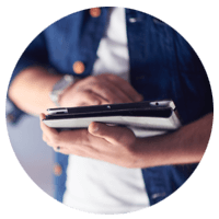 Close up of hands holding tablet
