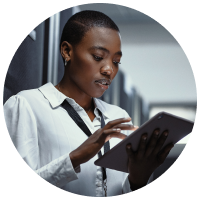 Office manager using tablet computer