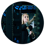 Businesswoman pointing inside server room