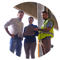 Supply chain personnel discuss shipping information to increase operational efficiency