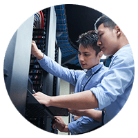 IT technicians review data center logistics