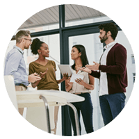 Group of business professionals standing and using cloud technology