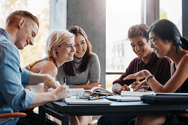 Group of teammates discuss creative strategy