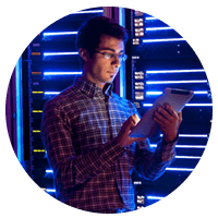 IT engineer on tablet device in data center