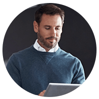 Businessman uses tablet device