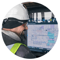 Construction working looking at real time data
