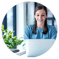 Woman smiling using a laptop