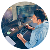 Programmer working on desktop