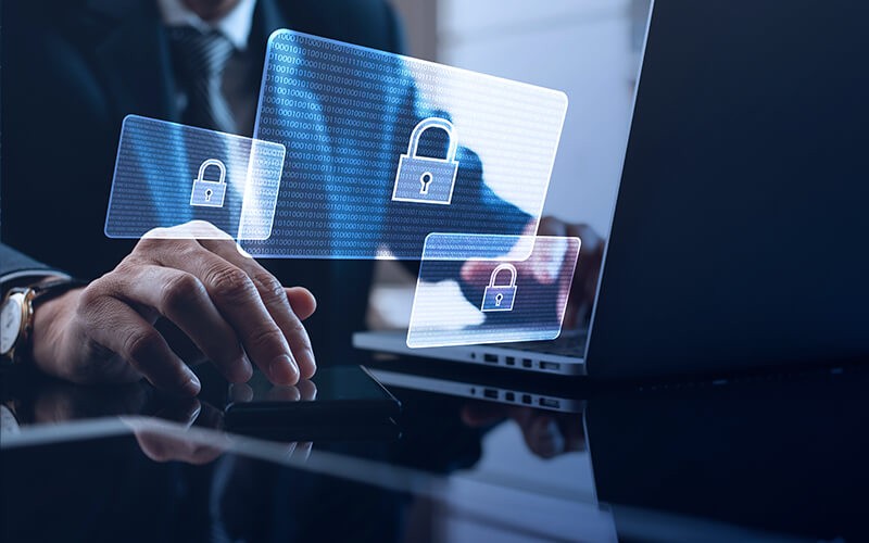 Stay ahead of threats and ever evolving cyberattacks with Trend Micro Apex One IT Professional working on laptop