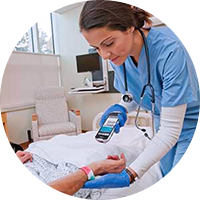 Nurse using a Zebra healthcare device