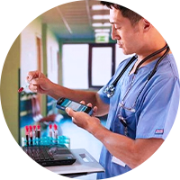 Nurse holding a Zebra healthcare device