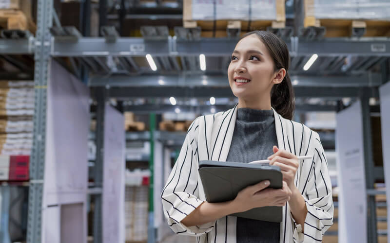 Equip your employees with tools to get work done Business owner on tablet checking inventory in warehouse