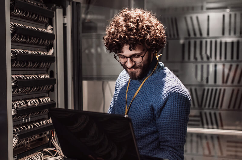 IT Infrastructure Services IT network engineer setting up modern data center and wireless network