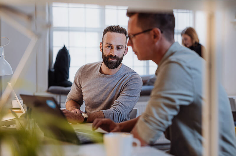 Development team collaborating in modern office