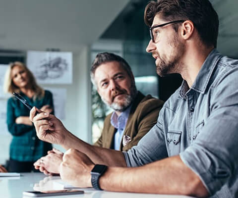 Simplified logistics for seamless deployments Business professionals brainstorming ideas to keep assets updated