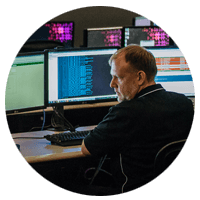IT professional managing technology system
