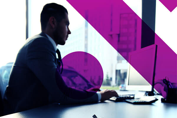 Business professional on desktop computer