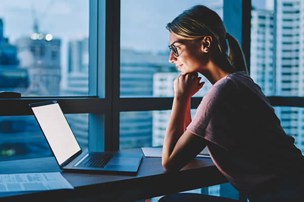 Business professional using laptop computer