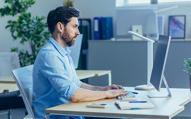 eDiscovery & compliance Man working using his computer
