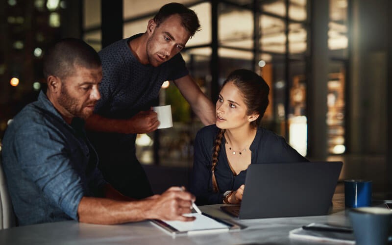 Symantec Endpoint Protection Three coworkers collaborating