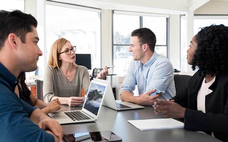 Experience and skill to deliver end-to-end IT transformation Business team discusses multiple data migration methods to client