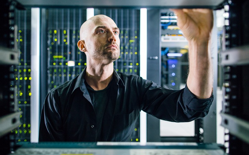 Gain a competitive edge IT engineer reviews open server rack for new rack mounted hard drive