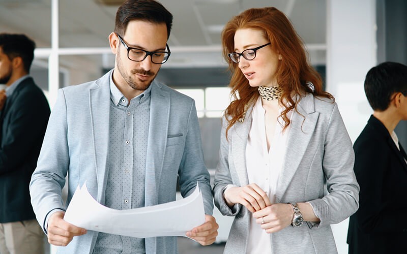 We’ll lay out all of your options for improvement Two business professionals review strategy for converged infrastructures
