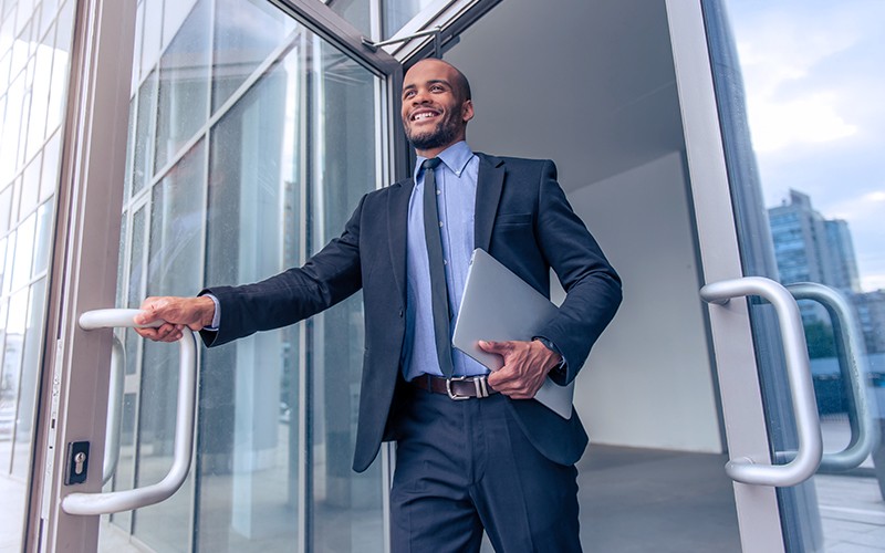 Private by design Man happily opening the door