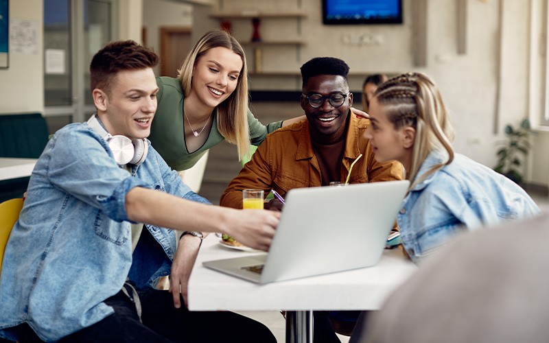 Education reimagined. students in front of laptop