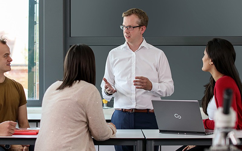 Teacher speaking to a class