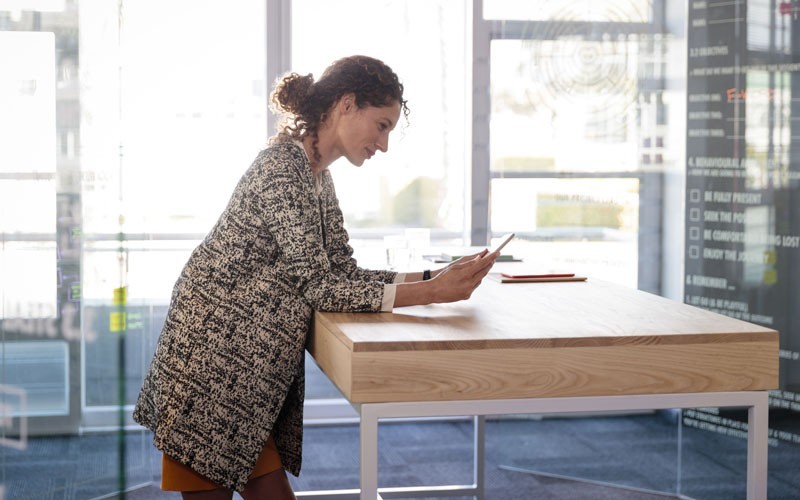 Woman using HPE tablet device