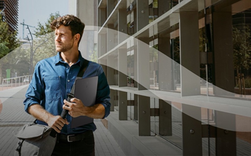 Samsung smartwatches Man walking with Samsung Chromebook