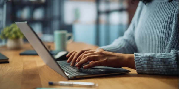 Know your clients better than ever with CRM. Business man working on workforce applications on desktop computer