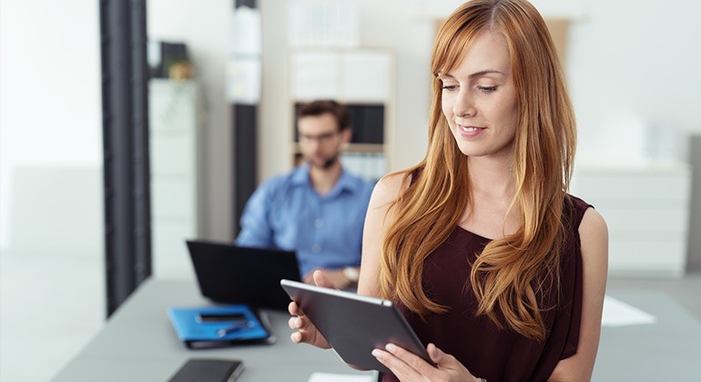Leading the way with Azure protection Business woman using azure on her tablet