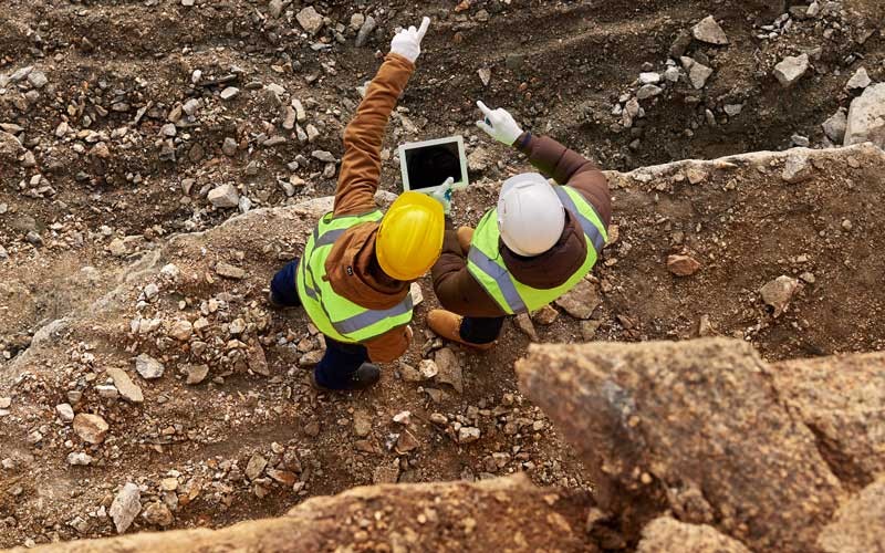 Flexibility to accommodate any device Construction worker on tablet device outside