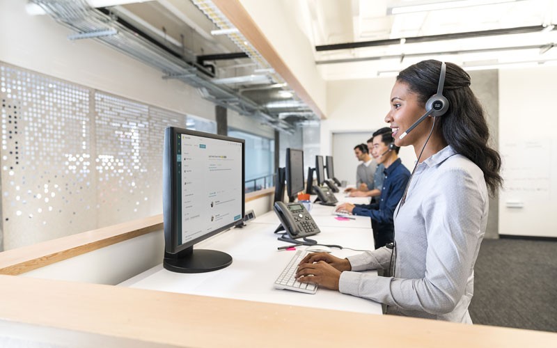 Cisco Smart Net Total Care Cisco woman using Cisco headset lifestyle