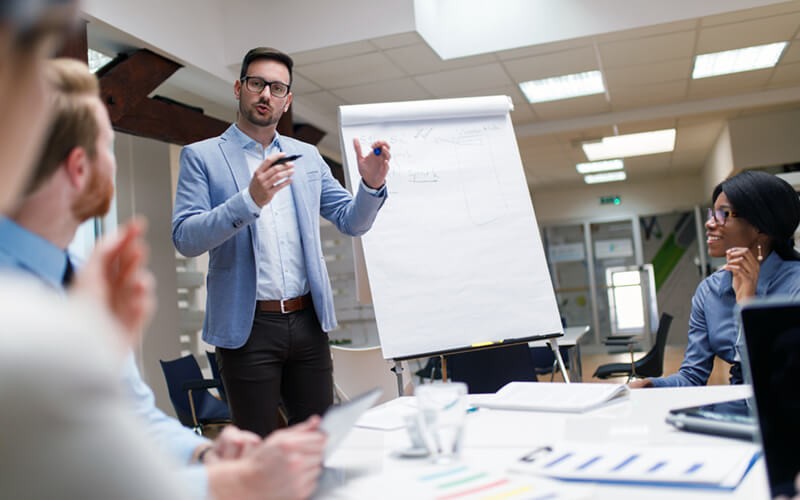 Cultivate successful digital strategy Lead designer presents in strategy workshop