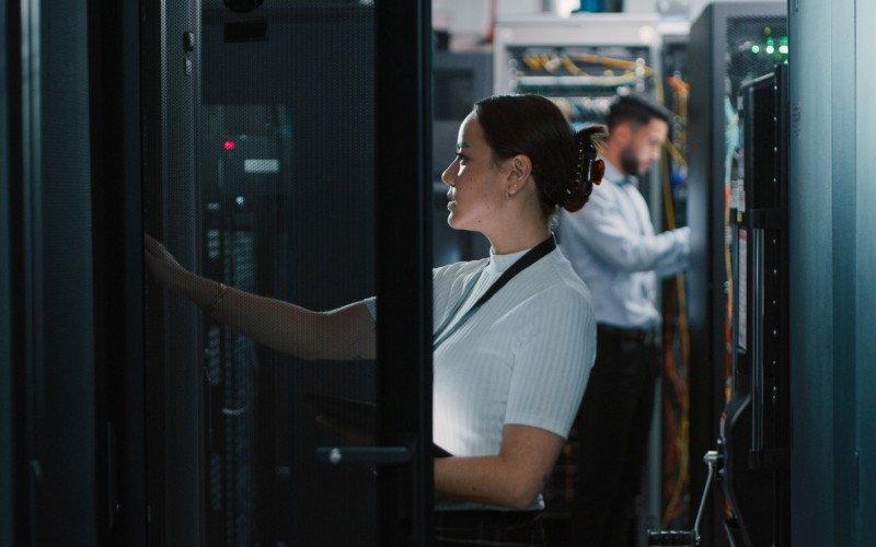 Tech team working in server room