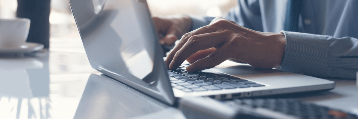 Users typing on computer